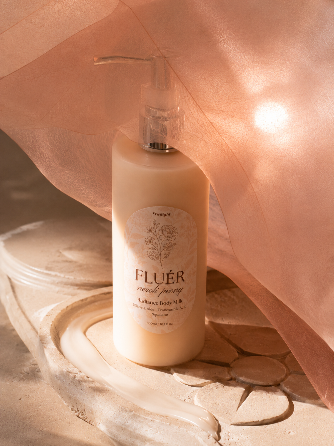 FLUÉR Body Milk in a light editorial setting for body care in humid weather